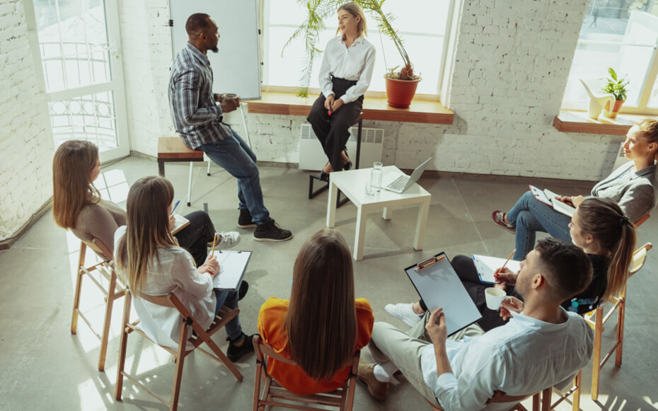 group of people sitting around a table