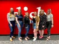 group of women posing for a picture