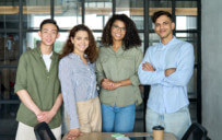 group of interns posing for the camera