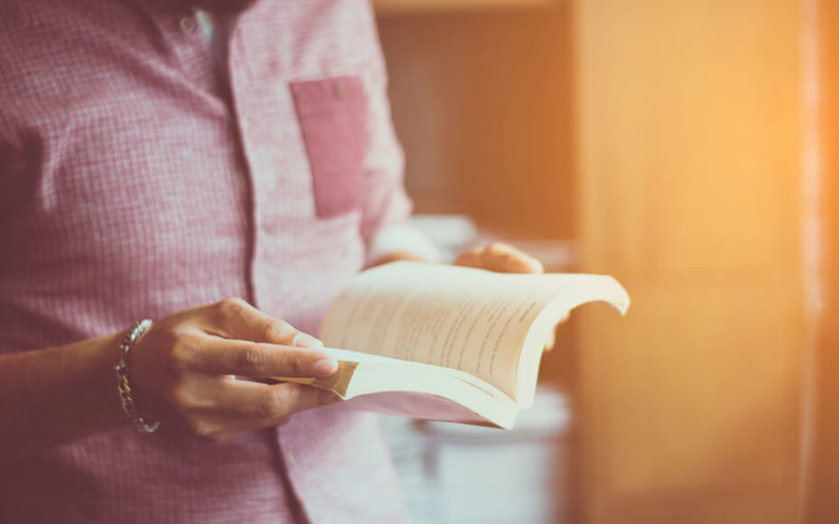 A college student takes on some summer reading.