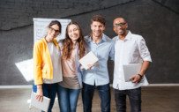 group of interns posing for the camera