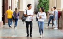 Students on campus walk to a career fair that they heard about via social media.