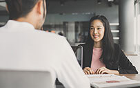 A young woman interviewing for an internship.