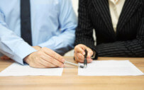 Man and woman reviewing a document