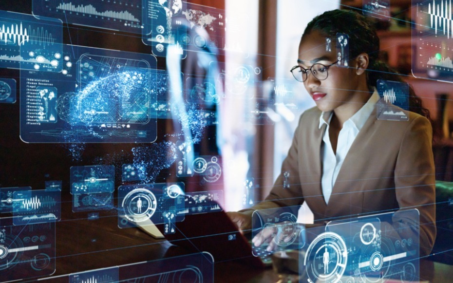 A computer science student works on her computer.