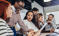 A group of interns work on a project.