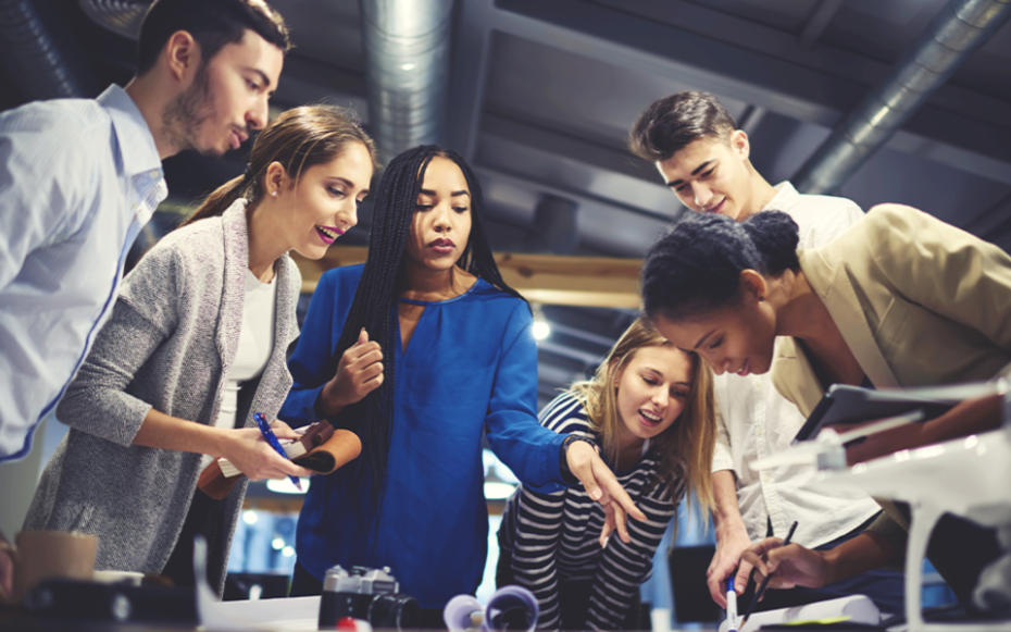 A group of students work together on a project.