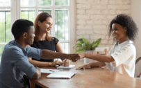 three people around a table